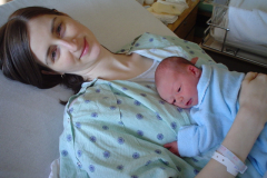 Oliver resting comfortably on his mommy, 1 day after birth